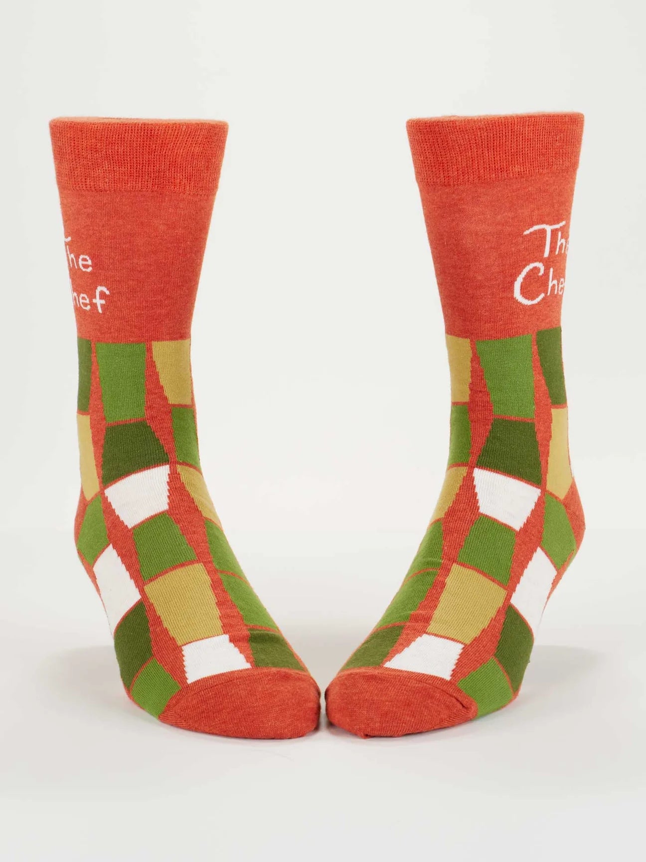 Red and green checkered socks with text saying The Chef on a white background