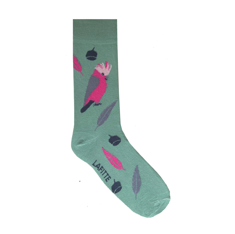 A mint green crew sock with a pink galah and grey gum nuts and gum leaves - The Sockery.