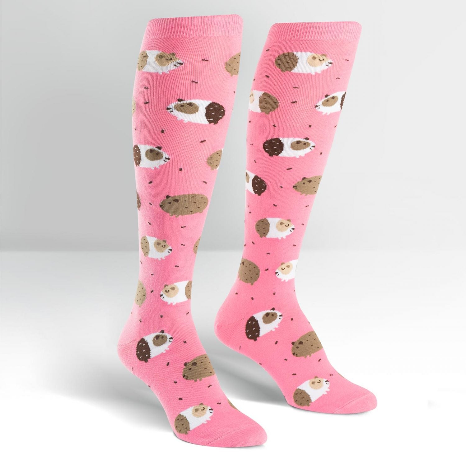 Pink knee high socks with brown and white guinea pigs all over - The Sockery