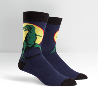 mens fun novelty sock in dark blue with a t rex dinosaur silhouetted against a yellow sun