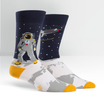 Mens novelty crew sock depicting a man landing on the moon and his space craft in the distance