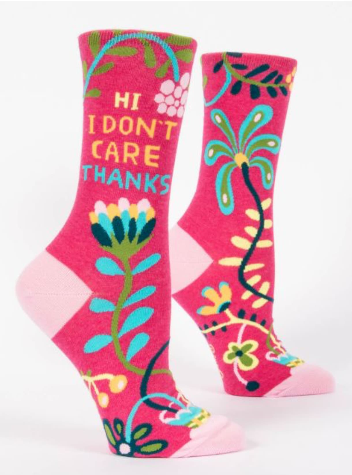 Pink sock with flowers in green and turquoise with the words "Hi I don't care thanks"