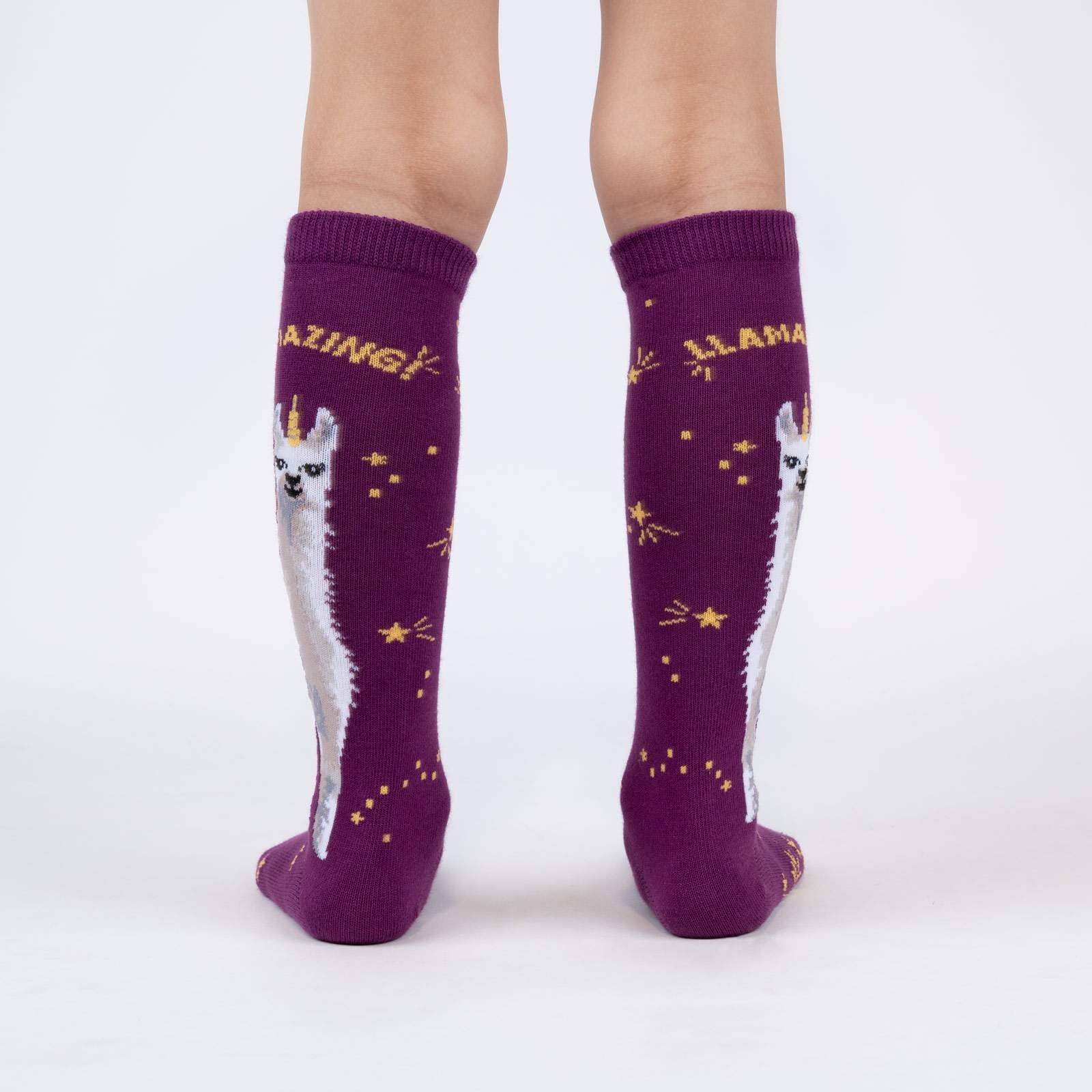 A lovely deep purple sock with a large llama on the side of the sock, with the words llama zing, back view - The Sockery