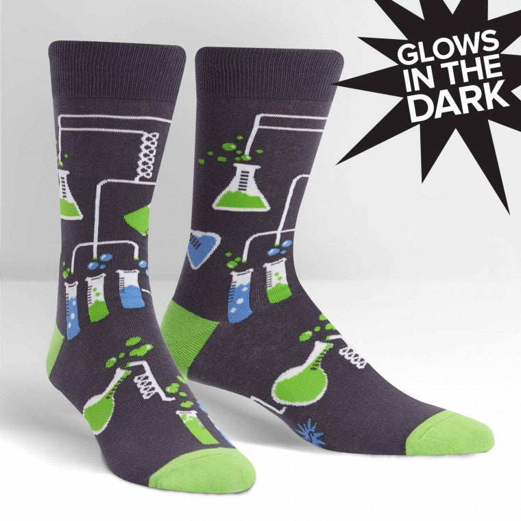 Featuring all things found in a good science lab - beakers, test tubes, glowing liquids, condensation flasks on a  steel grey mens crew sock - The Sockery