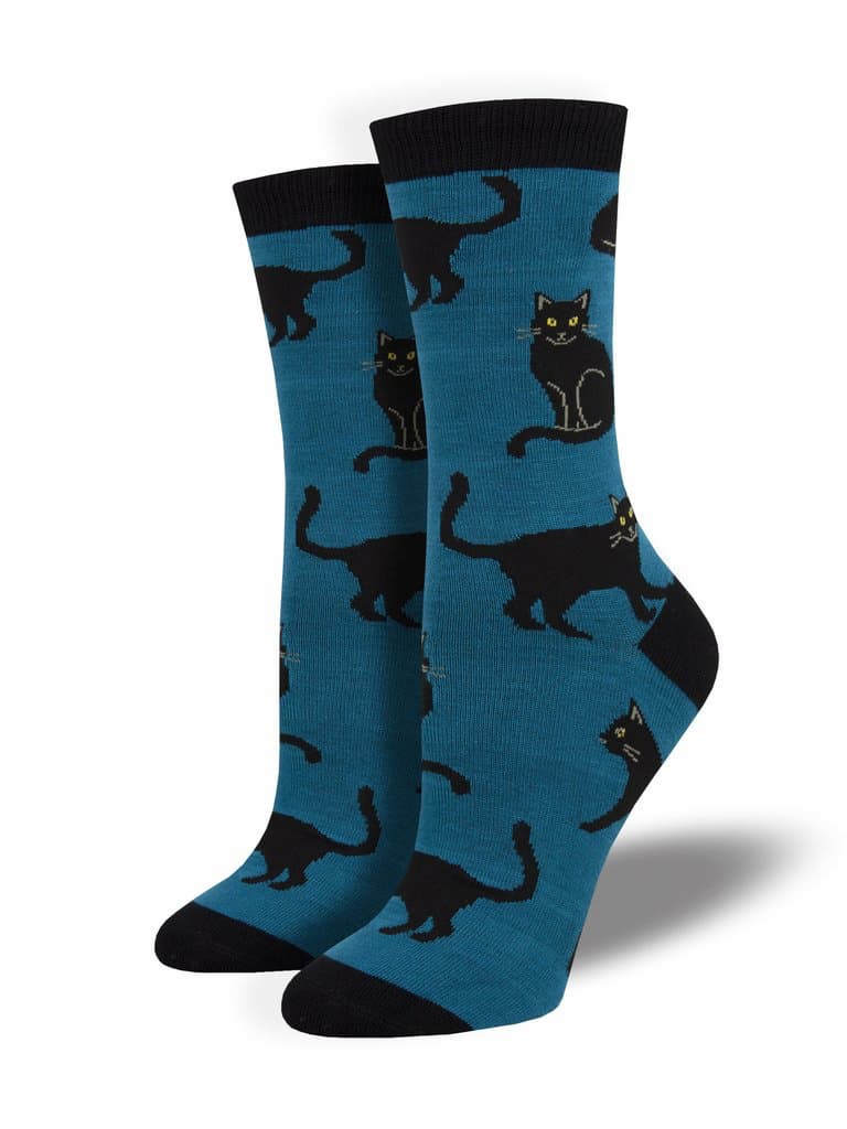 A blue womens bamboo crew sock with a design with black cats walking, sitting and sleeping
